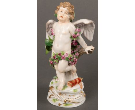 Stehender, leicht bekleideter Putto. Meissen 19. Jh. Porzellan, bunt bemalt, mit aufbossierten gewundenen Rosengirlanden, Soc
