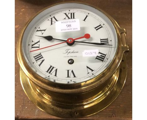 A brass mounted ships clock engraved Topsham.
