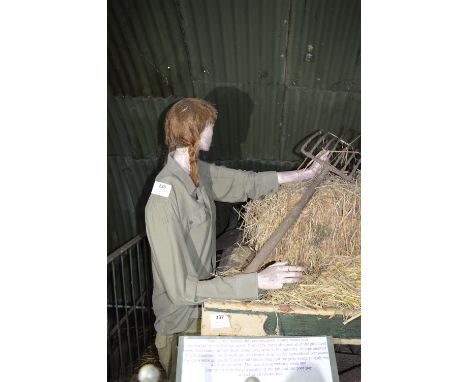 Female Mannequin Depicting a Land Girl with Sugar Beet Fork 