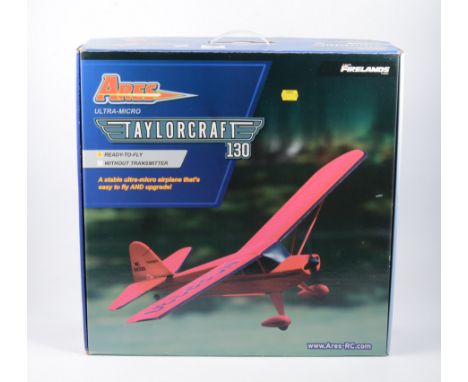 ULTRA MICRO TAYLORCRAFT 130 including spare motor, receiver, and Z props.   NIB
