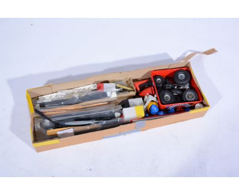 Box containing 18 large props, wheels, spinners, tanks, engine mounts, brass and alloy tubing.