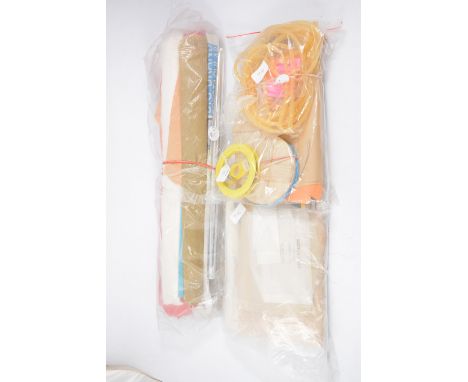 Four items: SURGICAL TUBING, CONVERING material, TRANSFERS and CL wire and props.