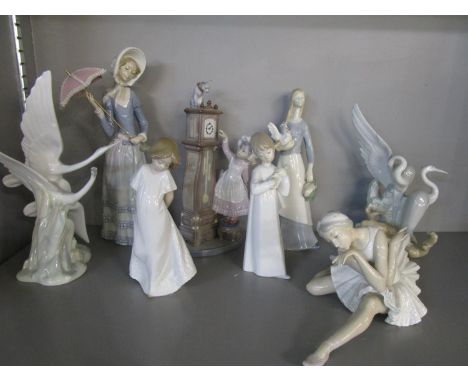 A group of Lladro and Nao figurines and a German figurine 