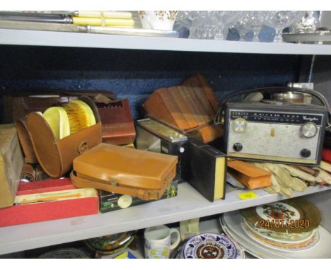 A vintage lot comprising gents driving gloves, a gents vanity set, a hip flask, a book rest with books, an Emerson radio and 