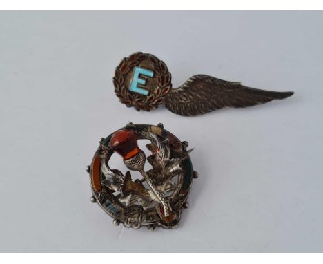 Two silver brooches wings and Scottish