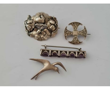 Four silver brooches   