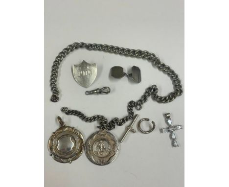 A shield shaped silver badge costume jewellery etc.