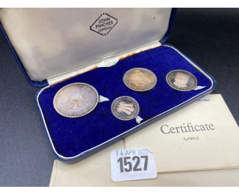 A boxed set of four silver investiture medals, 66g