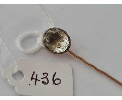 A Georgian crystal foil backed gold stick pin