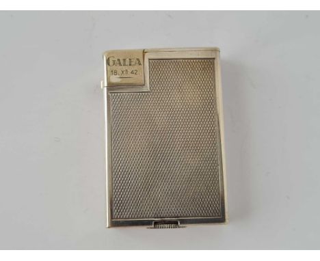 22. Antique rectangular engine turned silver plated DUNHILL lighter engraved 0the flame guard ‘GALEA 18. XII. 42’