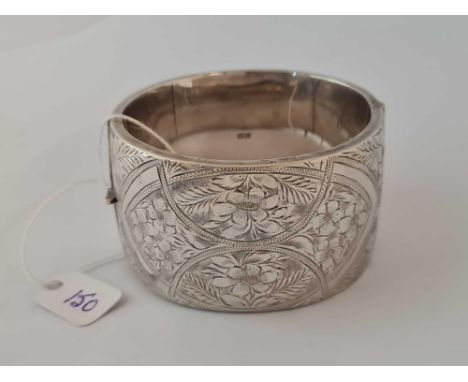 A very wide silver bangle    65 gms