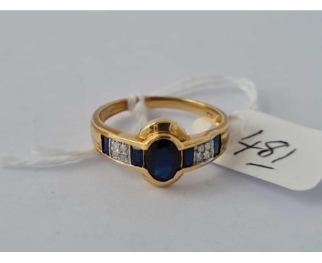 A sapphire &amp;diamond 10K ring size R 2.3g inc