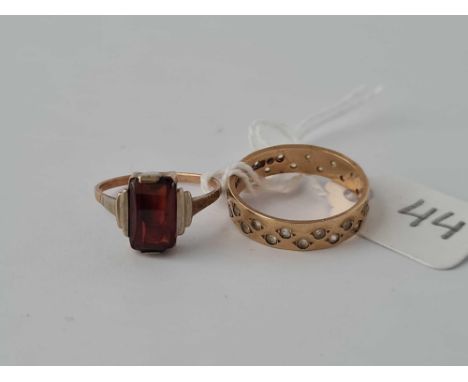 A white stone ring size N   together with a garnet ring size K AF   both 9ct    3.8 gms inc