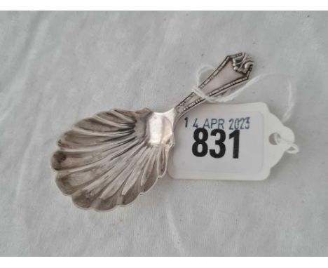 A caddy spoon with shell shaped bowl, London 1916