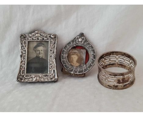 Two small photo frames, 2.5" high and a pierced napkin ring