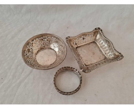 Two dishes with pierced sides and a napkin ring, Birmingham 1930 etc. 47 g.