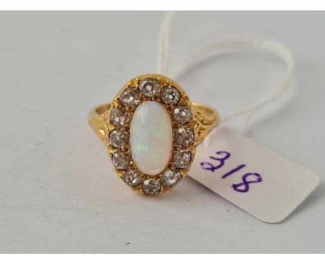 A GOOD OPAL AND DIAMOND CLUSTER RING 18CT GOLD SIZE Q