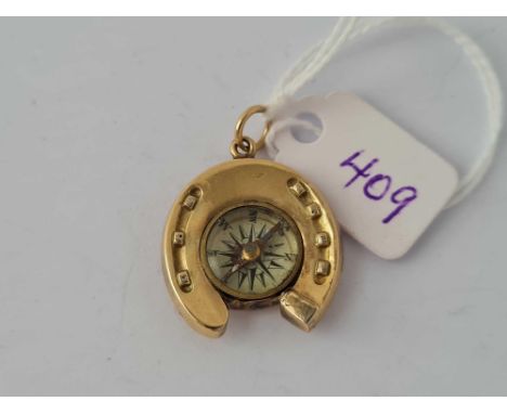 A good bnack and frotm horse shoe compass fob