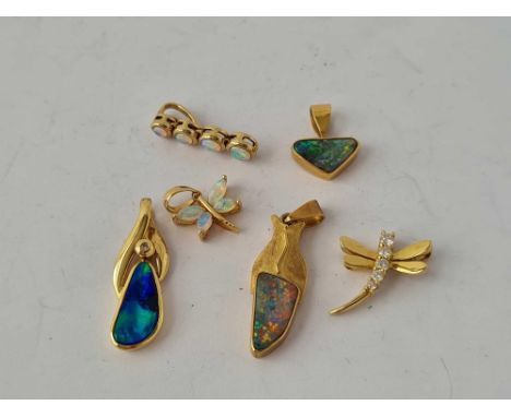 A QUANTITY OF OPAL PENDANTS 9CT AND 18CT GOLD    7.7 GMS