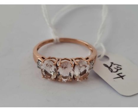 A three stone morganite and diamond ring 9ct size Q     2 gms