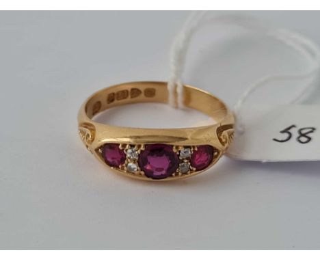 A EDWARDIAN THREE STONE RUBY AND DIAMOND RING CHESTER 1902 18CT GOLD SIZE R    4.6 GMS