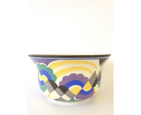 A large Carter Stabler Adams Limited red bodied Poole Pottery fruit bowl, shape 400, decorated in the UV pattern by Mary Brow