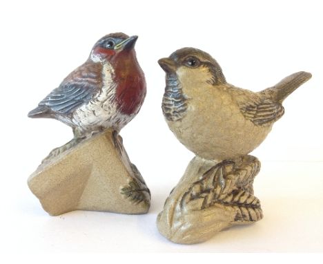 A Poole Pottery Barbara Linley Adams cold painted stoneware model of a Robin together with a sparrow on a Wheatear.