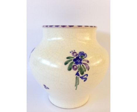 A red bodied Carter Stabler Adams Poole Pottery small globular vase, shape 345, decorated in the simple H floral pattern by R