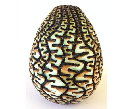 A Poole Pottery Atlantis carved vase, A2/3 by Beatrice Bolton, decorated in tones of pale green and brown.