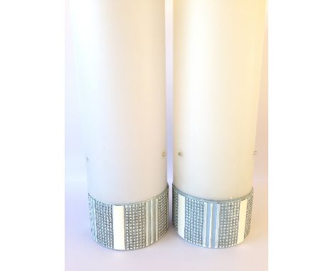 A pair of Poole Pottery Robert Jefferson Helios carved and glazed lamps, decorated in tones of grey, magnolia and blue with o