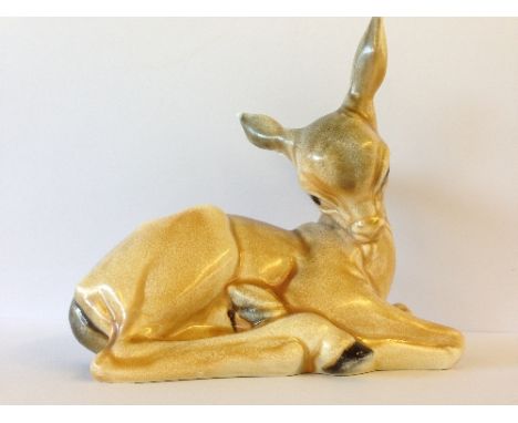 A Poole Pottery Picotee glazed model of a Fawn, shape 406 (larger version), glaze C54, after a design by Marjory Drawbell. 
