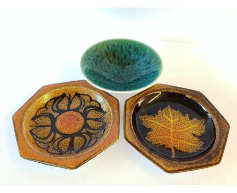 Two Aegean dishes, shape 42, decorated in leaf designs together with a small Poole Pottery Studio flared bowl, decorated in t