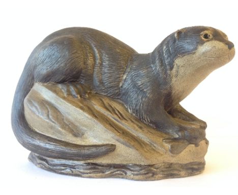 A Poole Pottery Barbara Linley Adams stoneware model of an Otter.