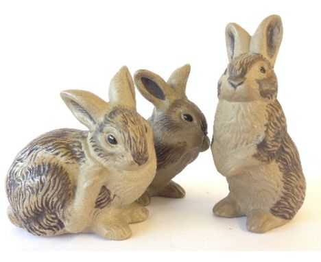 A set of three Poole Pottery Barbara Linley Adams stoneware models of Rabbits.