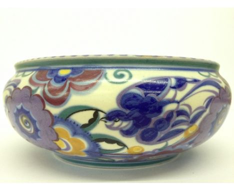 A Poole Pottery red bodied fruit bowl decorated in the PB Bluebird pattern by Hilda Hampton (8.5 inches overall).  
