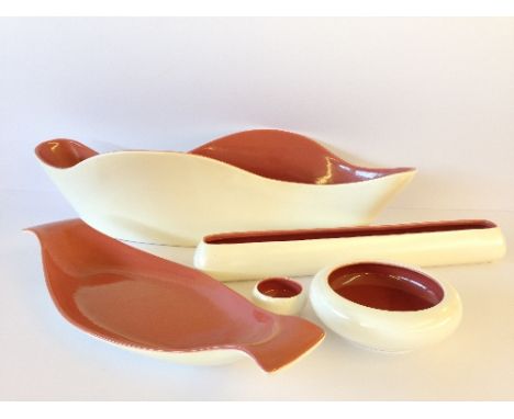Five various Poole Pottery items including a contemporary flower arranging trough, decorated in the Red Indian colour.