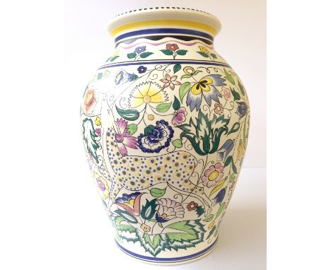 A large unglazed Poole Pottery hand painted vase decorated in the SK Leaping Deer design by Susan Russell (12.5 inches).