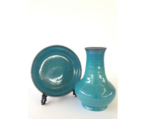 A Poole Pottery red bodied Chinese Blue glazed vase, shape 607, together with a matching dish.