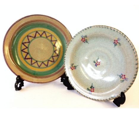 A red bodied Carter Stabler Adams Poole Pottery transitional plate, shape 282, decorated in the HB pattern by Ethel Barrett t