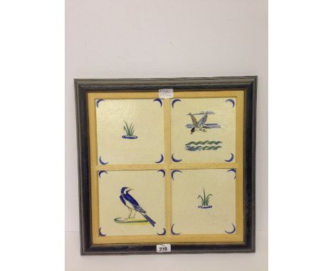 A set of four framed Poole Pottery tiles from the Waterbird series designed by Harold Stabler (mounted in later frame).