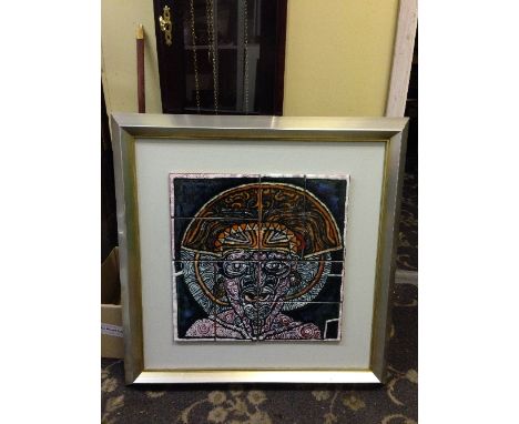 A Tony Morris Home Studio Tile panel (Poole Pottery INt) depicting a tattooed Mayan Indian Warrior wearing a head crescent, m