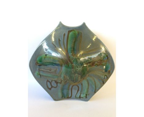 A Poole Pottery "Packet of Crisps" shaped vase, decorated in an abstract pattern on grey/blue ground in tones of green and br