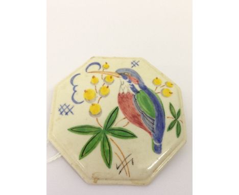 An early 20th century Poole Pottery octagonal shape brooch decorated in the V55/ZC bird pattern by Ruth Pavely (2.25 inches a