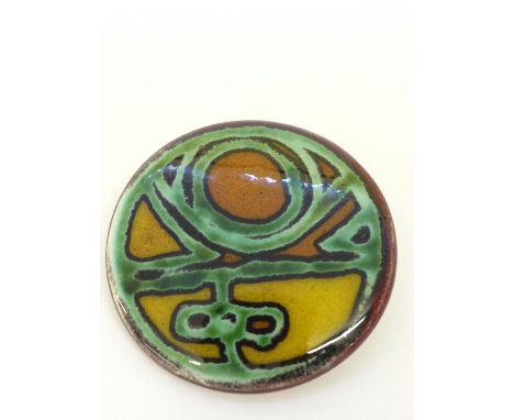 A Limited Edition Poole Pottery Studio brooch, 121/200, decorated in a Delphis abstract design, painted by Carroll Cutler cir