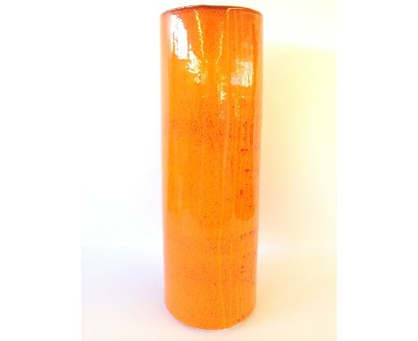A tall Poole Pottery cylindrical vase, shape 85, decorated in an orange glaze (15.5 inches), (examine).