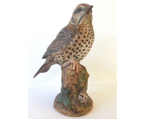 A Poole Pottery Barbara Linley Adams cold painted stoneware model of a Thrush.