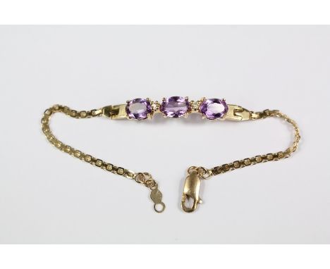 14ct gold amethyst and diamond bracelet, approx 12 cms l, approx 3.8 gms.