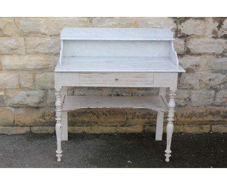 Marble vanity unit, with a central drawer with lower towel shelf, approx 57 d x 100 w x 105 h cms.&nbsp;