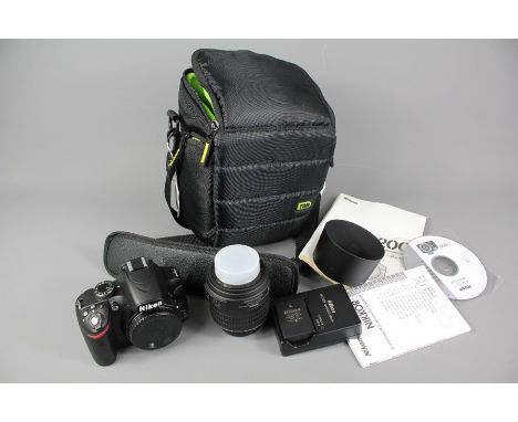 Nikon Digital Camera D3200, together with a Nikon AF-S DX Nikkor 18-55mm lens, complete with camera case, strap, battery pack