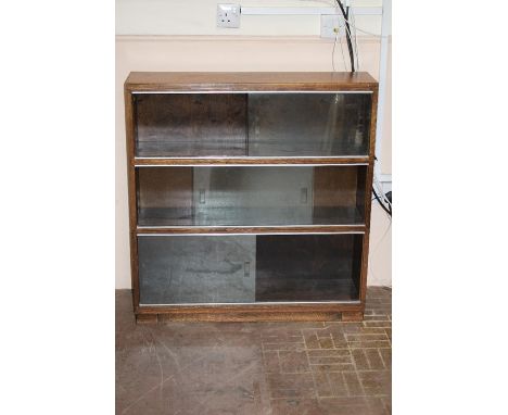Vintage Minty mahogany stacking bookcase, glaze fronted, approx 89w x 94 h x 23 d cms.&nbsp;